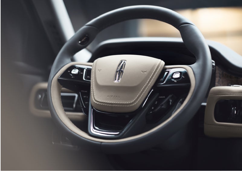 The intuitively placed controls of the steering wheel on a 2023 Lincoln Aviator® SUV | West Point Lincoln of Sugar Land in Houston TX