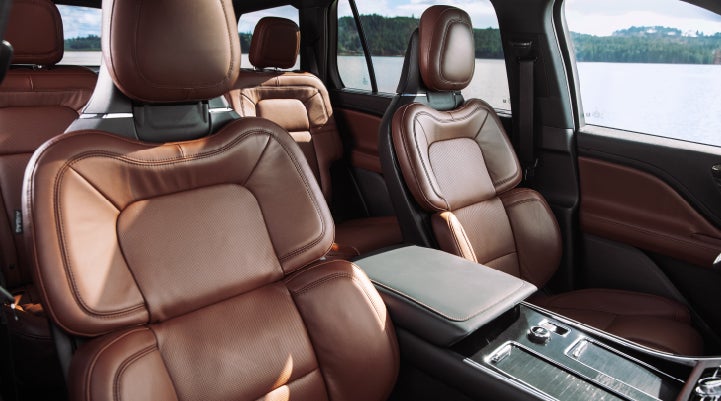 The front row's Perfect Position Seats in a 2024 Lincoln Aviator® Reserve model with Ebony Roast interior | West Point Lincoln of Sugar Land in Houston TX