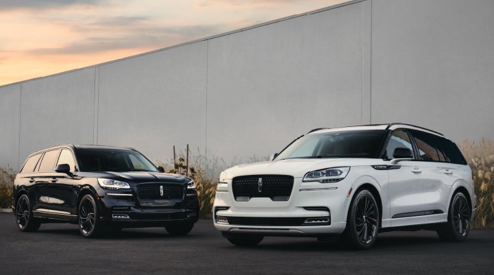 Two Lincoln Aviator® SUVs are shown with the available Jet Appearance Package | West Point Lincoln of Sugar Land in Houston TX